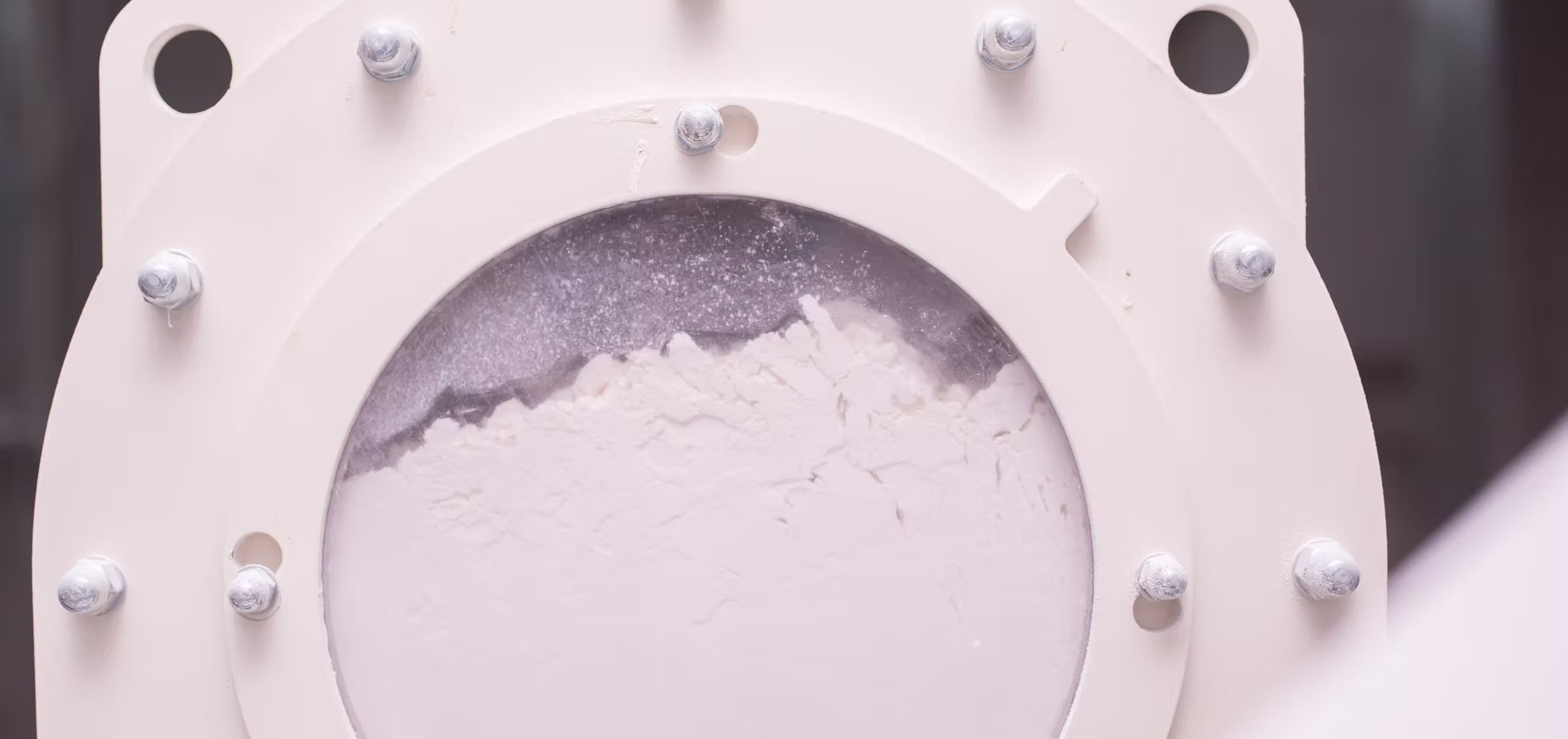 Sight glass on the milling line showing fresh tapioca starch